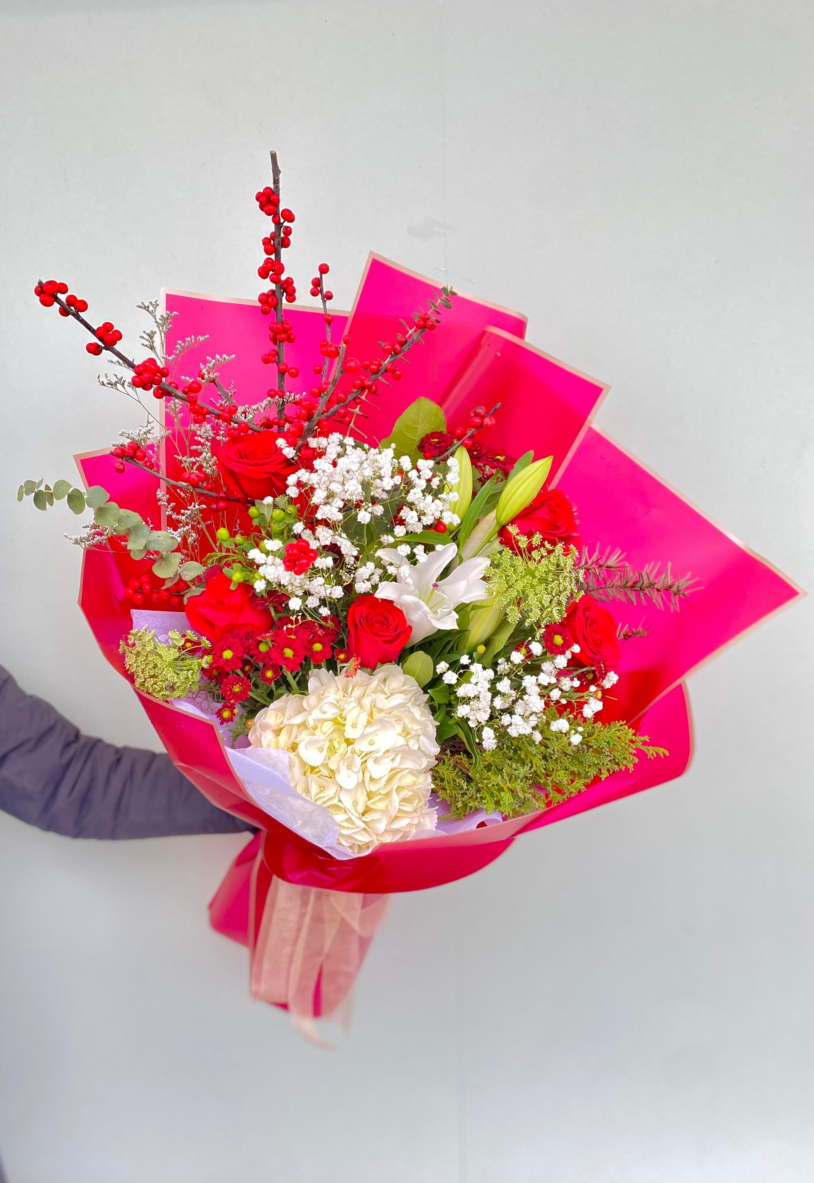 Designer’s Choice Holiday Handtied bouquet - Four Seasons Floristry